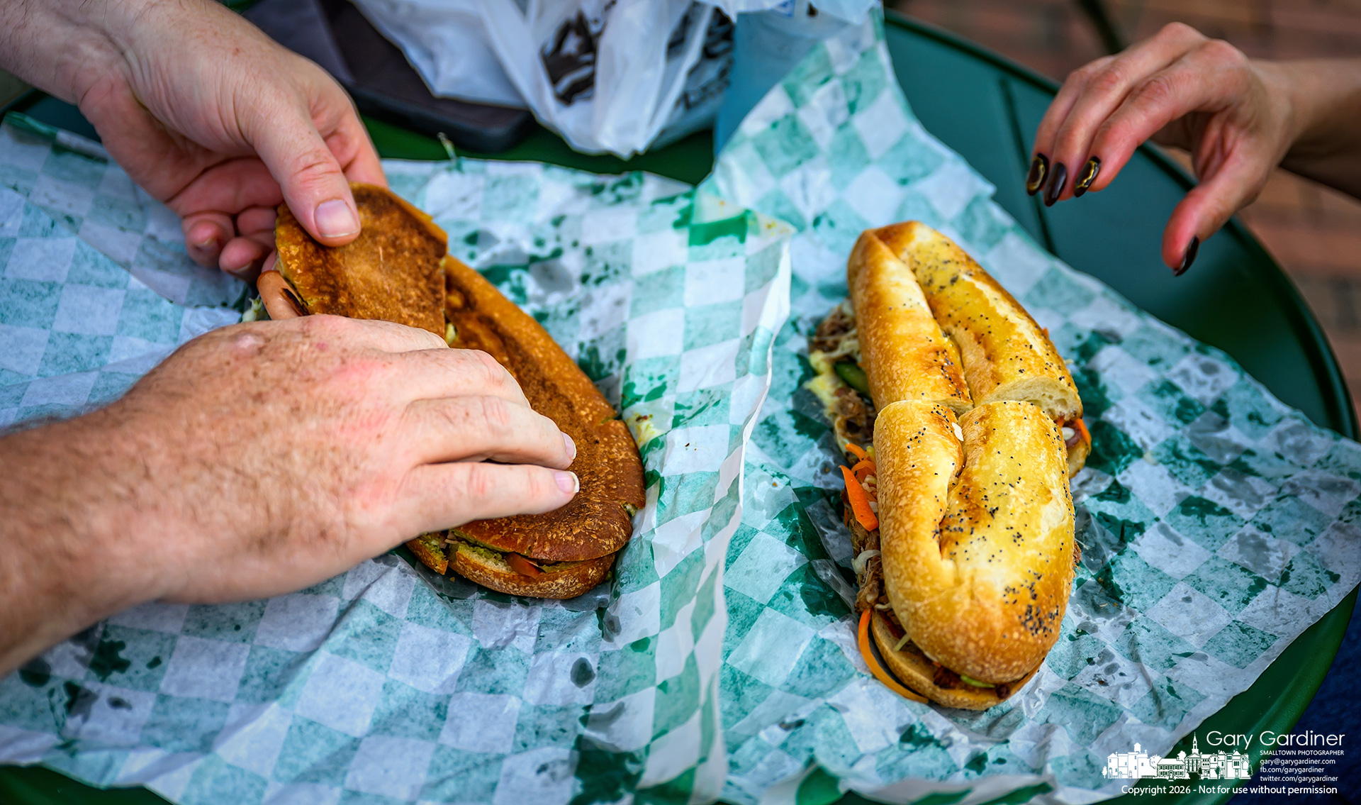 Sandwiches were the choice for this couple, who were the first customers at the opening of Fat Arnie's Provecho in Uptown Westerville. (My Final Photo for October 1, 2026. Photo by Gary Gardiner)
