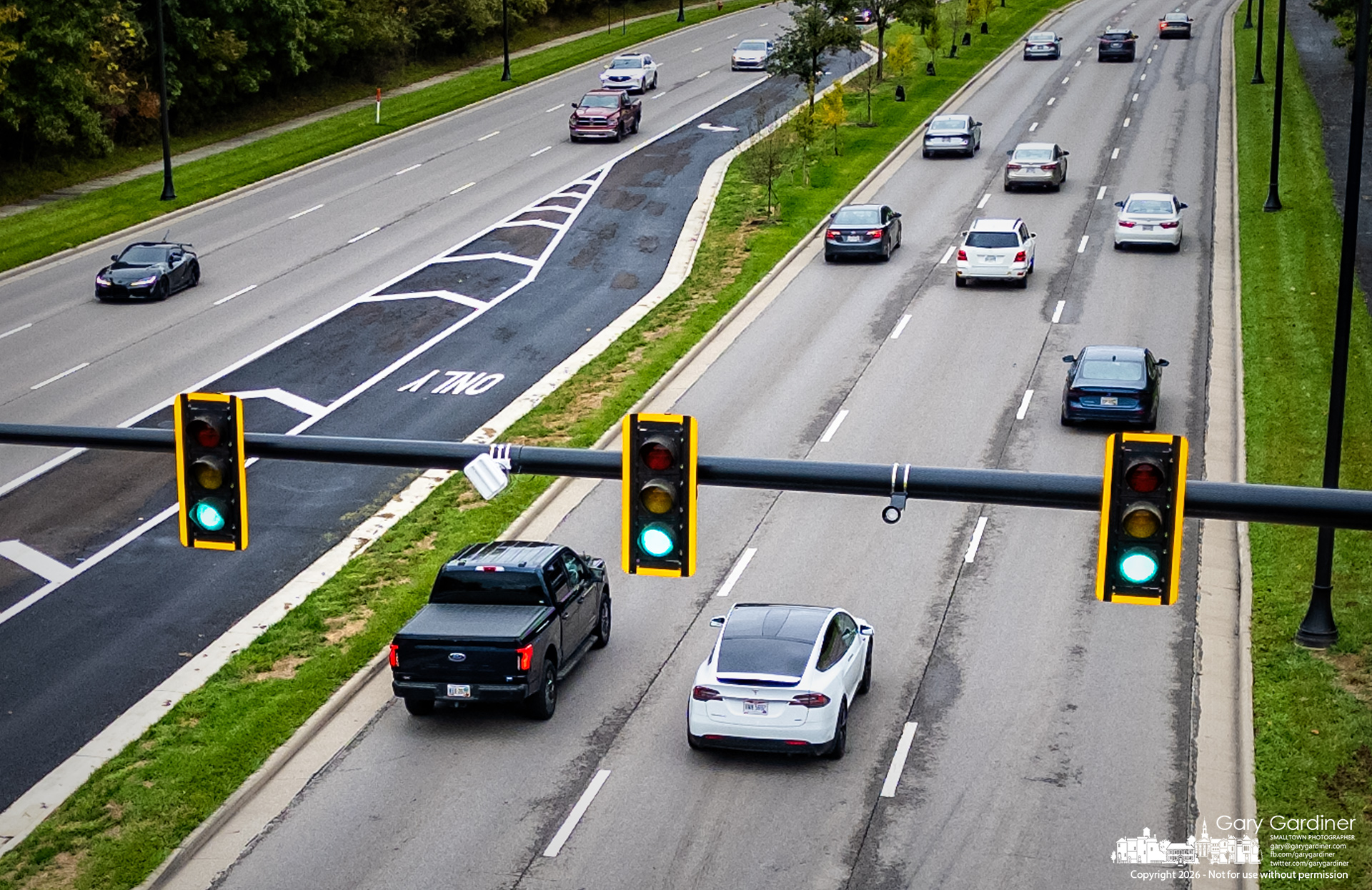 The new set of traffic signals are active on Polaris Parkway at the intersection with Atlas Avenue, connecting Polaris to Westar Park's new road system. (My Final Photo for October 11, 2026. Photo by Gary Gardiner)