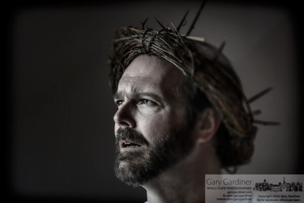 The man portraying Christ in the Good Friday Cross Walk stands inside the Church of the Messiah at the end of the annual procession through Uptown Westerville. My Final Photo for April 18, 2014. The man portraying Christ in the Good Friday Cross Walk stands inside the Church of the Messiah at the end of the annual procession through Uptown Westerville. My Final Photo for April 18, 2014.