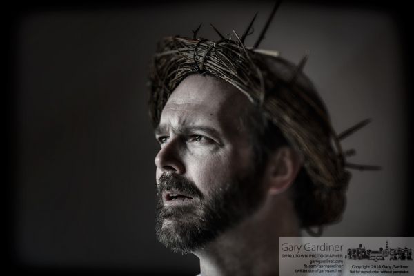 The man portraying Christ in the Good Friday Cross Walk stands inside the Church of the Messiah at the end of the annual procession through Uptown Westerville. My Final Photo for April 18, 2014. The man portraying Christ in the Good Friday Cross Walk stands inside the Church of the Messiah at the end of the annual procession through Uptown Westerville. My Final Photo for April 18, 2014.