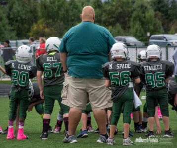 The Eagles football team stands in the shadow of one of their coaches as they prepare for a game at Westerville North High School Sunday afternoon. My Final Photo for Oct. 15, 2017. The Eagles football team stands in the shadow of one of their coaches as they prepare for a game at Westerville North High School Sunday afternoon. My Final Photo for Oct. 15, 2017.