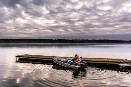 A fisherman’s boat creates ripples as it settles into the water pulling away from the dock at Hoover Reservoir on a cloudy and cool September morning. My Final Photo for Oct. 13, 2017. A fisherman’s boat creates ripples as it settles into the water pulling away from the dock at Hoover Reservoir on a cloudy and cool September morning. My Final Photo for Oct. 13, 2017.