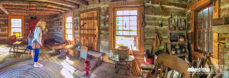 A mother and child explore the Knox-Metzker Log Cabin at McVay Elementary School during the Ned Mosher Apple Butter Festival that celebrates a much earlier Westerville lifestyle, living in a restored log cabin. My Final Photo for Oct. 1, 2017. A mother and child explore the Knox-Metzker Log Cabin at McVay Elementary School during the Ned Mosher Apple Butter Festival that celebrates a much earlier Westerville lifestyle, living in a restored log cabin. My Final Photo for Oct. 1, 2017.