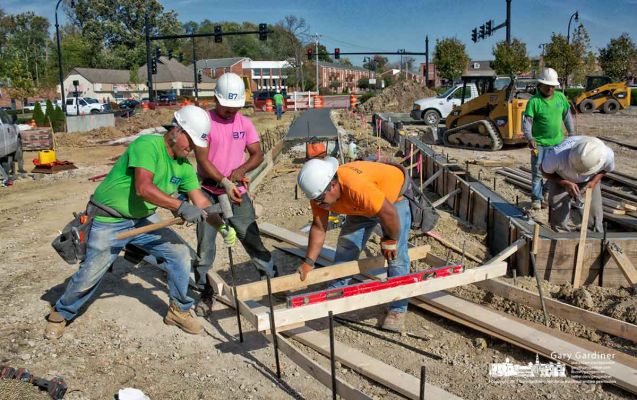 Construction workers install forms for the new sidewalks leading into the parking lot in front of Panera on South State Street where the new intersection is expected to be finished by the end of the month. My Final Photo for Oct. 19, 2017. Construction workers install forms for the new sidewalks leading into the parking lot in front of Panera on South State Street where the new intersection is expected to be finished by the end of the month. My Final Photo for Oct. 19, 2017.