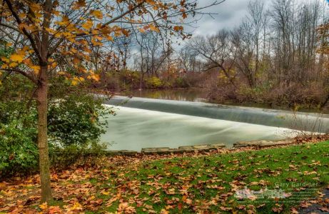 Rushing water flows over the lowed dam at Alum Creek Park North in Westerville during a Sunday afternoon rain storm. My FinalPhoto for Nov. 5, 2017 Rushing water flows over the lowhead dam at Alum Creek Park North in Westerville during a Sunday afternoon rain storm. My Final Photo for Nov. 5, 2017.