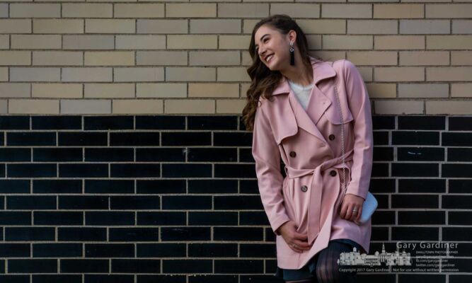 A teenage model poses along East Main Street in Uptown Westerville during a photo shoot for Pure Design Magazine. My Final Photo for Nov. 17, 2017. A teenage model poses along East Main Street in Uptown Westerville during a photo shoot for Pure Design Magazine. My Final Photo for Nov. 17, 2017.