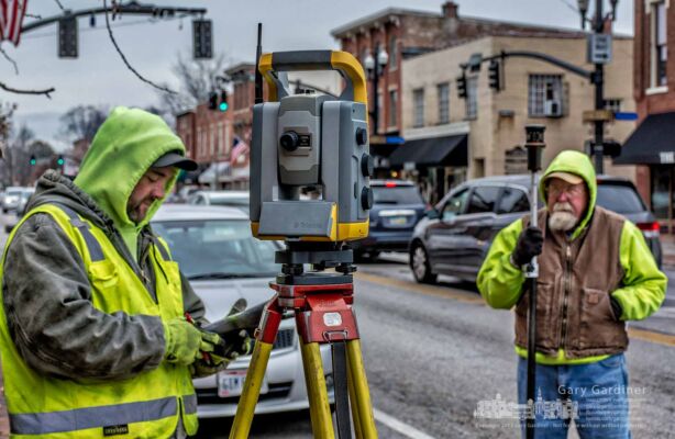 Surveyors using high-tech laser transits mark the boundaries and elevations on State Street from Home to Walnut in Uptown Westerville as part of city development planning. My Final Photo for Nov. 15, 2017. Surveyors using high-tech laser transits mark the boundaries and elevations on State Street from Home to Walnut in Uptown Westerville as part of city development planning. My Final Photo for Nov. 15, 2017.