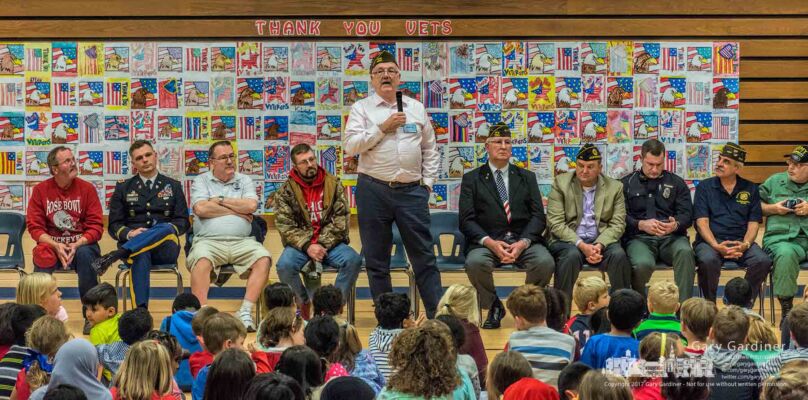 Children at Mark Twain Elementary and other veterans listen as a veteran describes his service during a Veterans Day rally at the school. My Final Photo for Nov. 10, 2017. Children at Mark Twain Elementary and other veterans listen as a veteran describes his service during a Veterans Day rally at the school. My Final Photo for Nov. 10, 2017.
