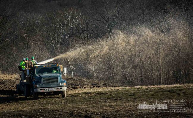 A landscaping crew blows straw across freshly seeded fields along Sunbury Road near Central College after a work crew leveled the ground in anticipation of future construction. My Final Photo for Dec. 20, 2017. A landscaping crew blows straw across freshly seeded fields along Sunbury Road near Central College after a work crew leveled the ground in anticipation of future construction. My Final Photo for Dec. 20, 2017.