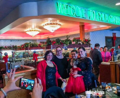 A waitress at China Garden Buffet photographs a family after they finished dinner at the Westerville restaurant on Christmas day. My Final Photo for Dec. 25, 2017. A waitress at China Garden Buffet photographs a family after they finished dinner at the Westerville restaurant on Christmas day. My Final Photo for Dec. 25, 2017.