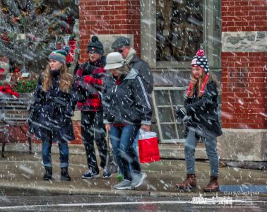 Shoppers in Uptown Westerville navigate their way a through a snow squall as they cross State Street at College Ave. My Final Photo for Dec. 23, 2017. Shoppers in Uptown Westerville navigate their way a through a snow squall as they cross State Street at College Ave. My Final Photo for Dec. 23, 2017.