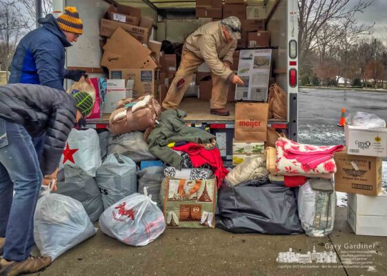 On a frigid winter morning volunteers gather coats and blankets donated to the St. Vincent dePaul Society at St. Paul Catholic Church Sunday morning. My Final Photo for Dec. 10, 2017. On a frigid winter morning volunteers gather coats and blankets donated to the St. Vincent dePaul Society at St. Paul Catholic Church Sunday morning. My Final Photo for Dec. 10, 2017.